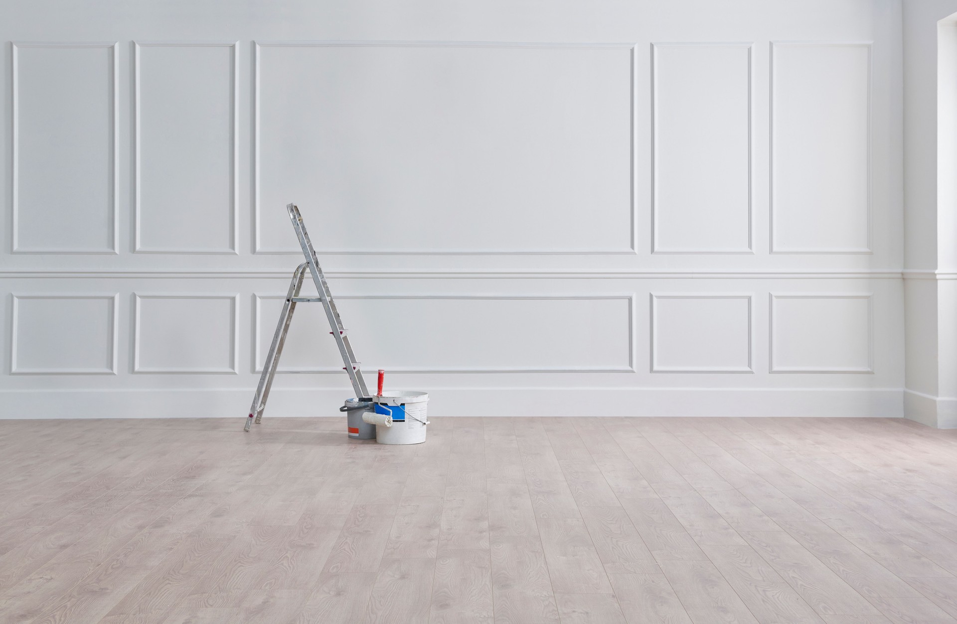 White classic wall, stairs, paint and brush, interior whitewash.